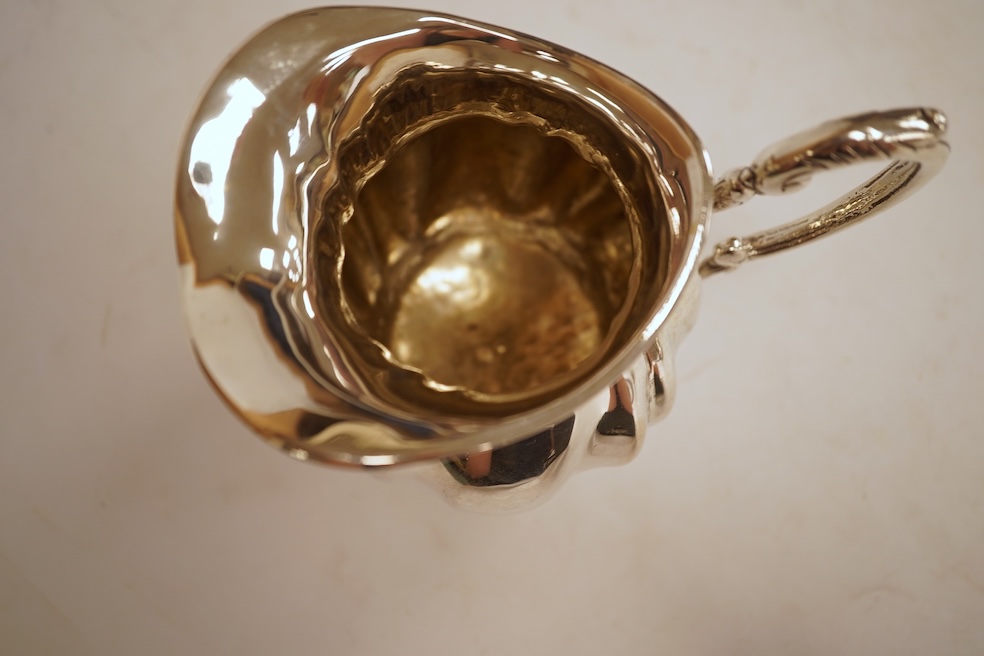 A 20th century Hungarian 800 standard white metal pedestal milk jug, post 1937 mark, height 10.6cm, 7.4oz.